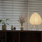 Modern Egg-Shaped Rice Paper Lantern Floor Lamp With Black Metal Frame - Image 4