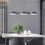 Modern Multi Light Cylinder Pendant Light With Wood Accents - Image 4