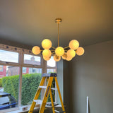 Brass Sputnik Chandelier With Opal Glass Globes - Image 6