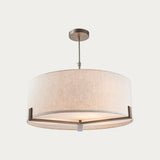 Linen Cylindrical Pendant Light With Brass Hardware And Adjustable Height - Image 1