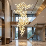 Luxury Gold Spiral Staircase Chandelier With Ceramic Petal Shades - Image 4
